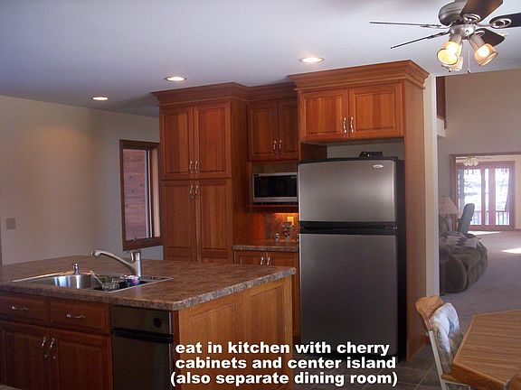 eat in kitchen w/cherry cabinets
