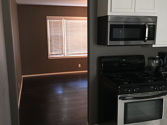 Kitchen leading into living room