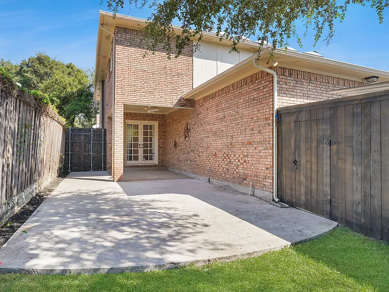 Private backyard with large patio and green space as well.