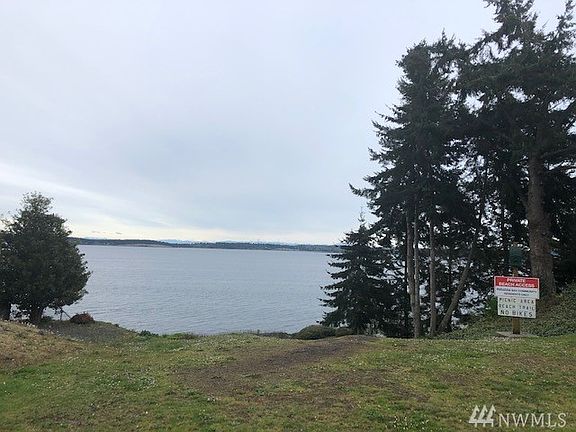 Fresh and clean inside and out....front porch and water view deck in back!