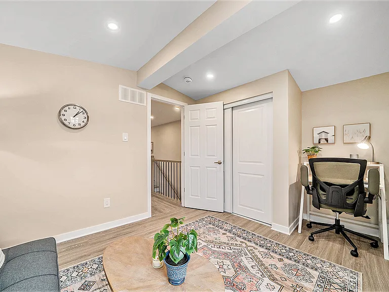 Multi-purpose den/office with a dedicated workspace in our Ottawa rental property.