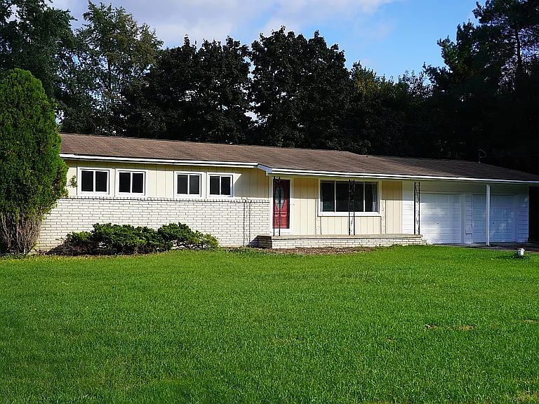 Front of the house, windows from bedrooms 1&2, as well as the front room. 2+ car garage has separate doors for each spot.