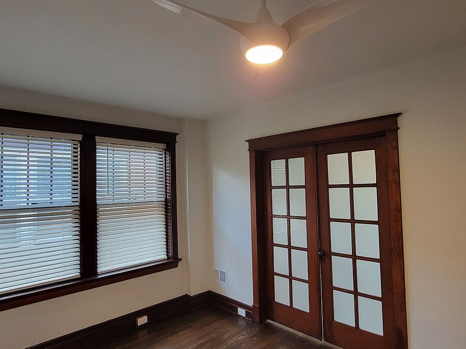Living Room with view of Bedroom 1 French Doors closed.