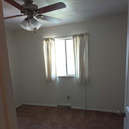THIS IS THE REAR BEDROOM.