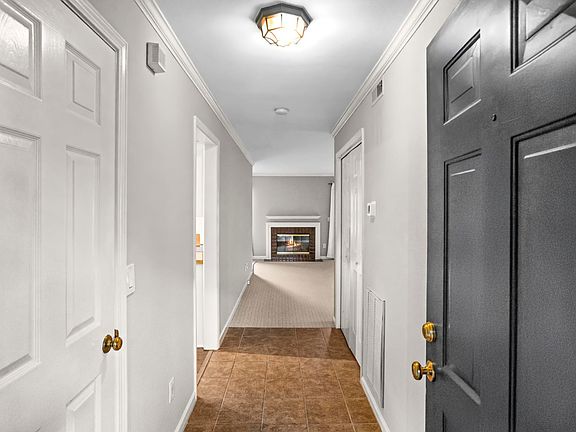 Entry Hall looking into LR with fireplace