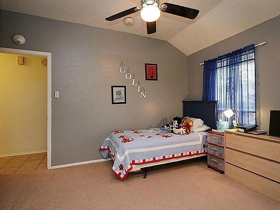 One of 3 secondary bedrooms. Ceiling fans in all for optimal cooling.