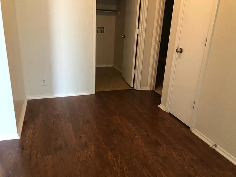 Foyer upstairs between bed, utility and Bathroom