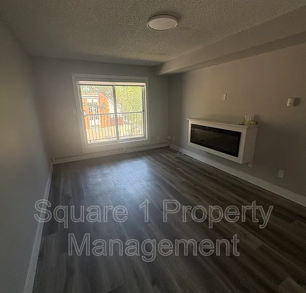 9905 83rd Ave NW #101 — Photo 1
