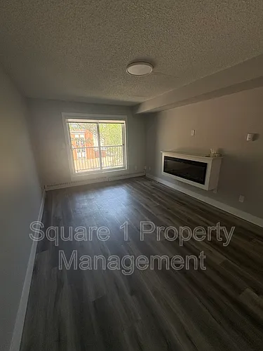 9905 83rd Ave NW #101 Photo 1