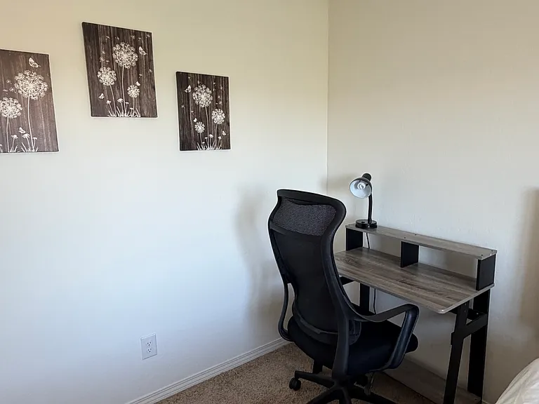 Work desk and computer chair in bedroom two