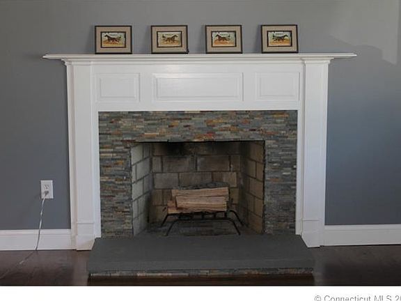 Resurfaced fireplace adds c...