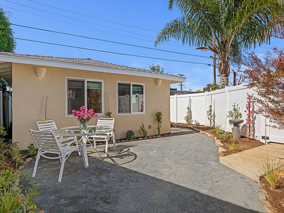 Enclosed yard with seating for morning coffee or dinner at sunset.