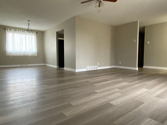 Dining Room and Living Room with new flooring