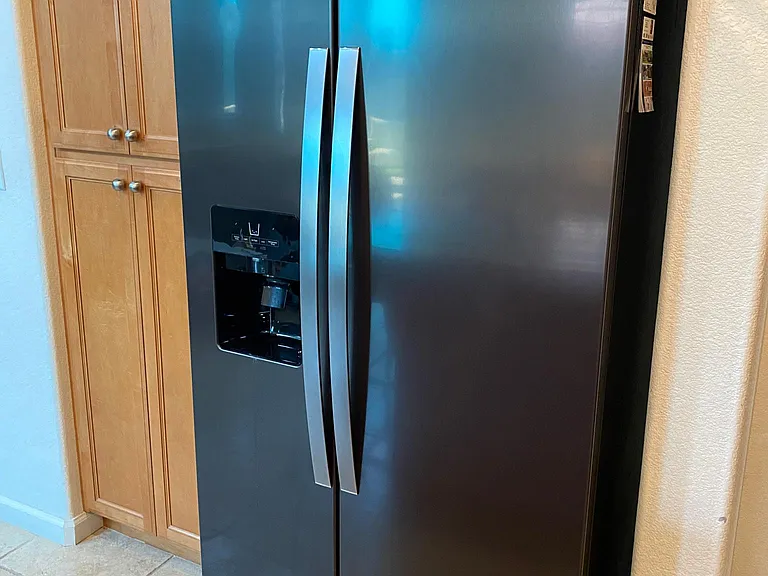 Refrigerator is included with home