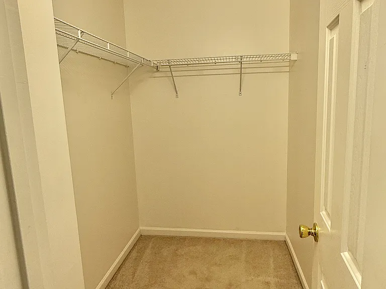 Primary Suite Walk-In Closet
