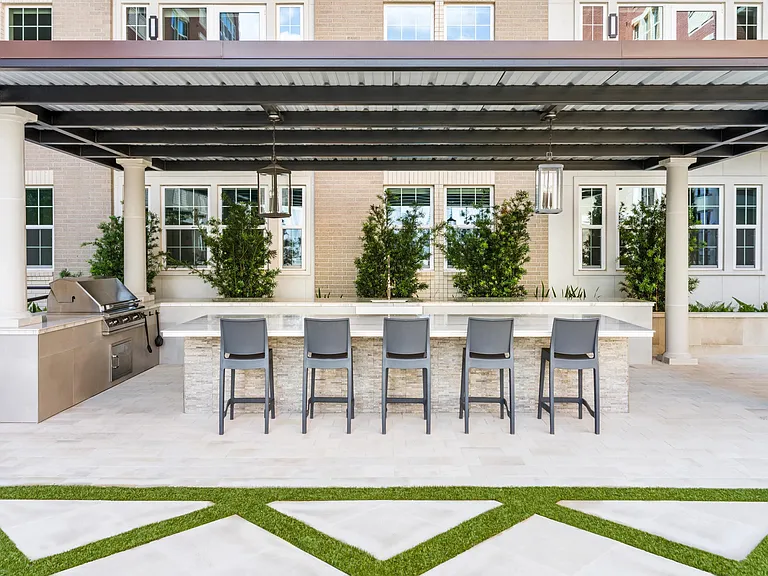 Unwind in style at Modera Waugh's poolside bar, the perfect spot to relax and enjoy a refreshing drink just steps from the water.