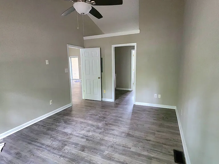 Beautiful Master with high ceiling and ceiling fan with ensuite dressing area, closet and bath.