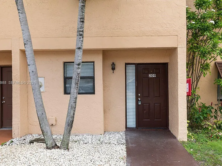 6854 NW 173rd Dr #209 — Photo 2