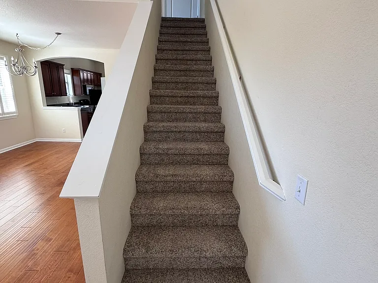 Now... up the stairs to two bedrooms and a full bathroom