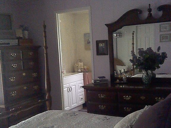 5th image of 447 NE Pinelake Village Blvd
