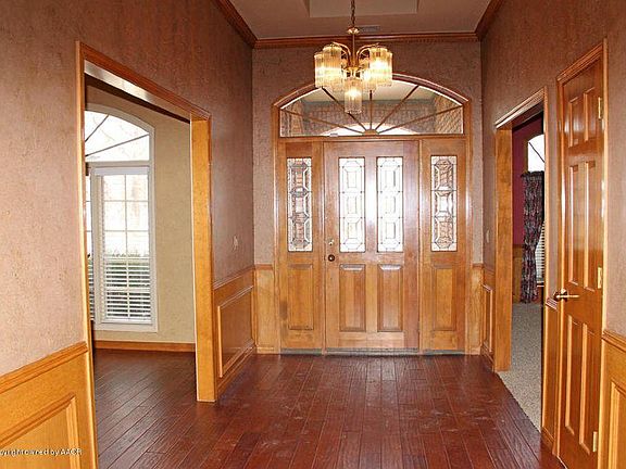Foyer looking from kitchen toward front door