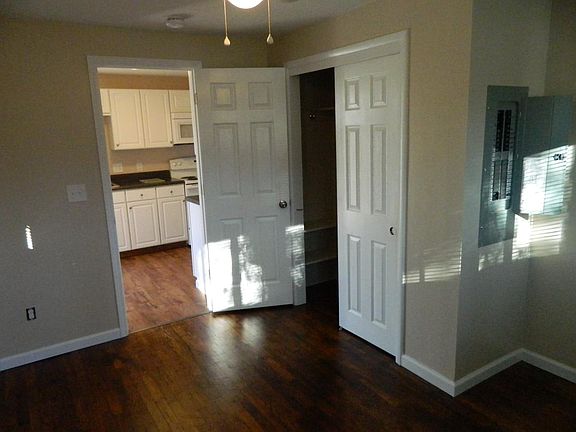 Bedroom looking into kitchen