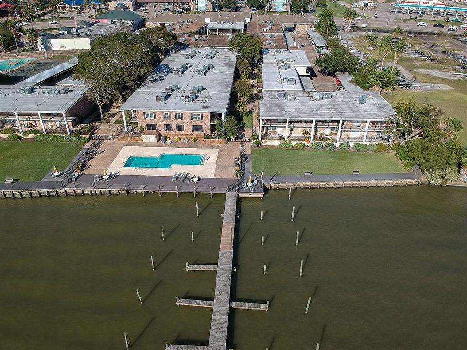 Nice complex and well maintained. Two assigned covered carport spots, gated access to the complex. HOA covers all utilities, water, sewer, gas, cable (basic), trash. All you pay is your electricity. They are working on boat slips and getting them rep