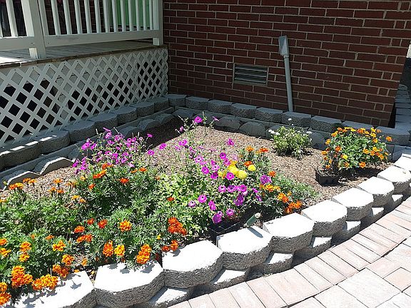 New flower bed off back deck