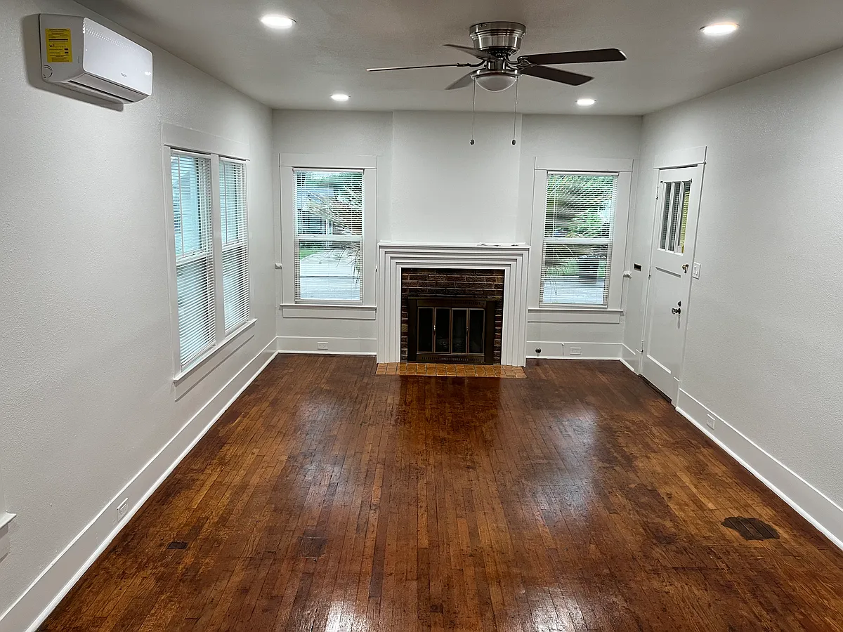Living room with fireplace and heating and cooling mini split - 746 Bailey Ave