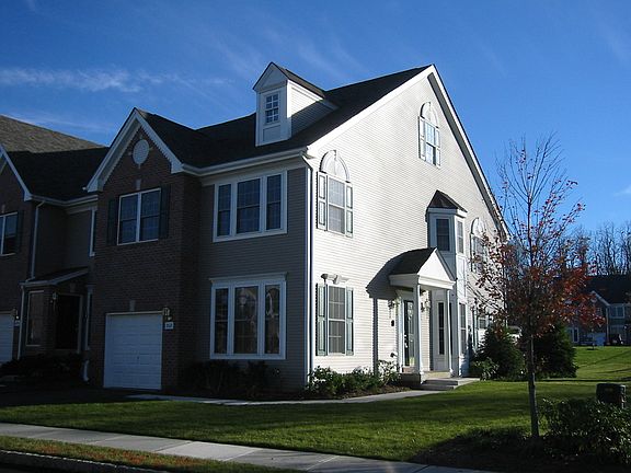 Attached 1 car garage with driveway. Open parking spaces jus