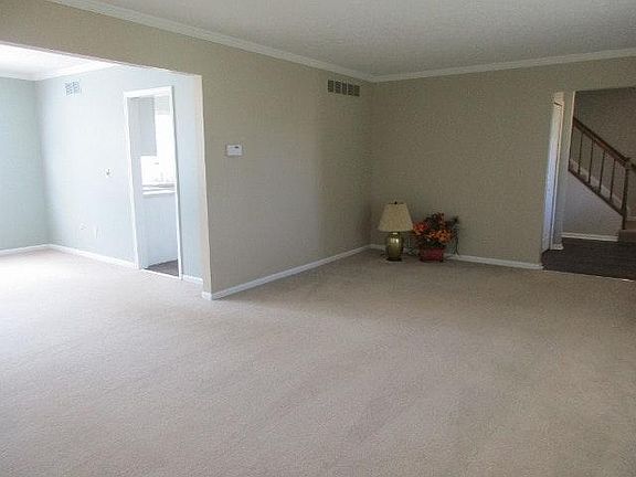 Living room between entry and dining room.