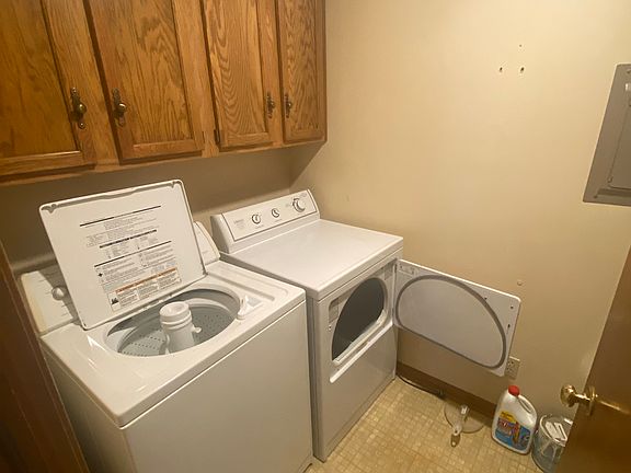 In-unit washer and dryer. Water heater and furnace also located here.