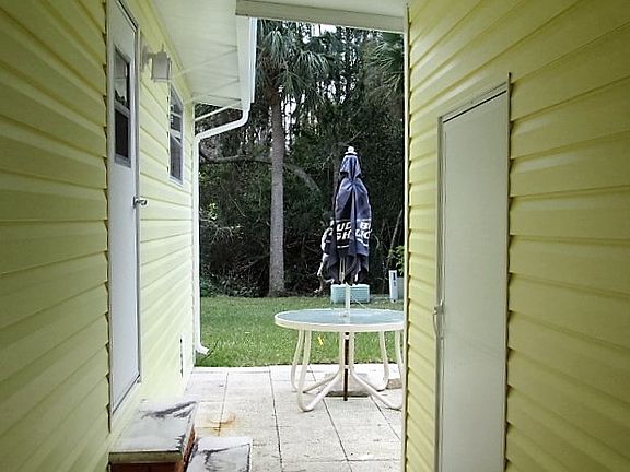 Rear patio behind storage shed