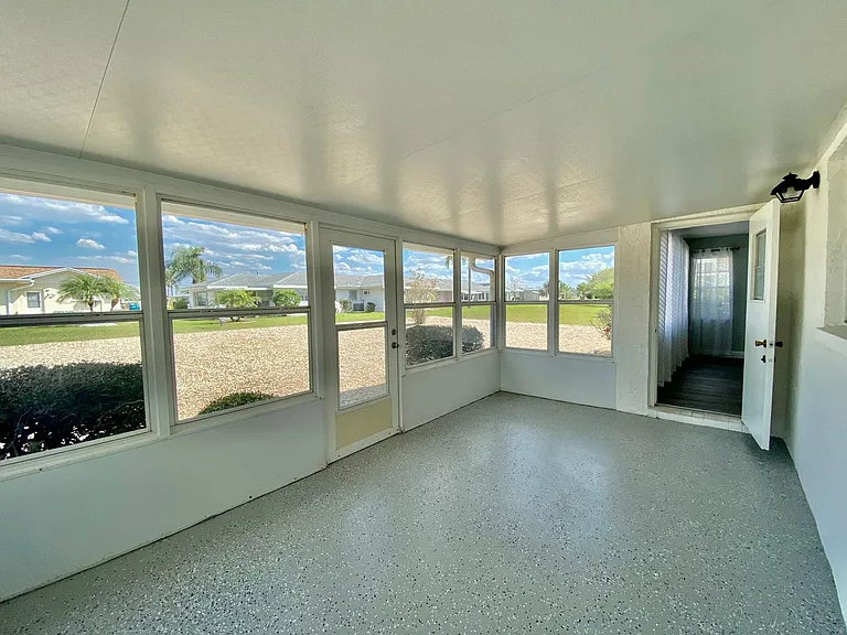 Enjoy the east-facing lanai with screened windows.