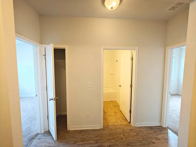 Bedroom 2, hallway bathroom, and bedroom 3