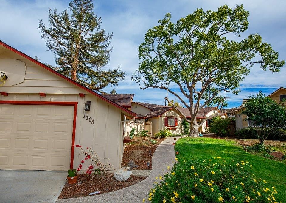 Large one-story house with wrap-around yard