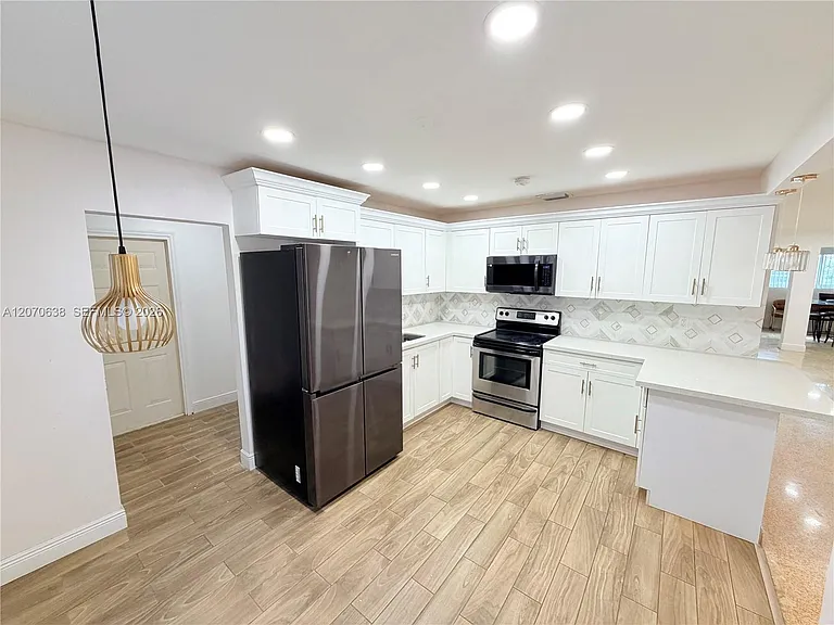 18711 NW 24th Ave — Photo 3