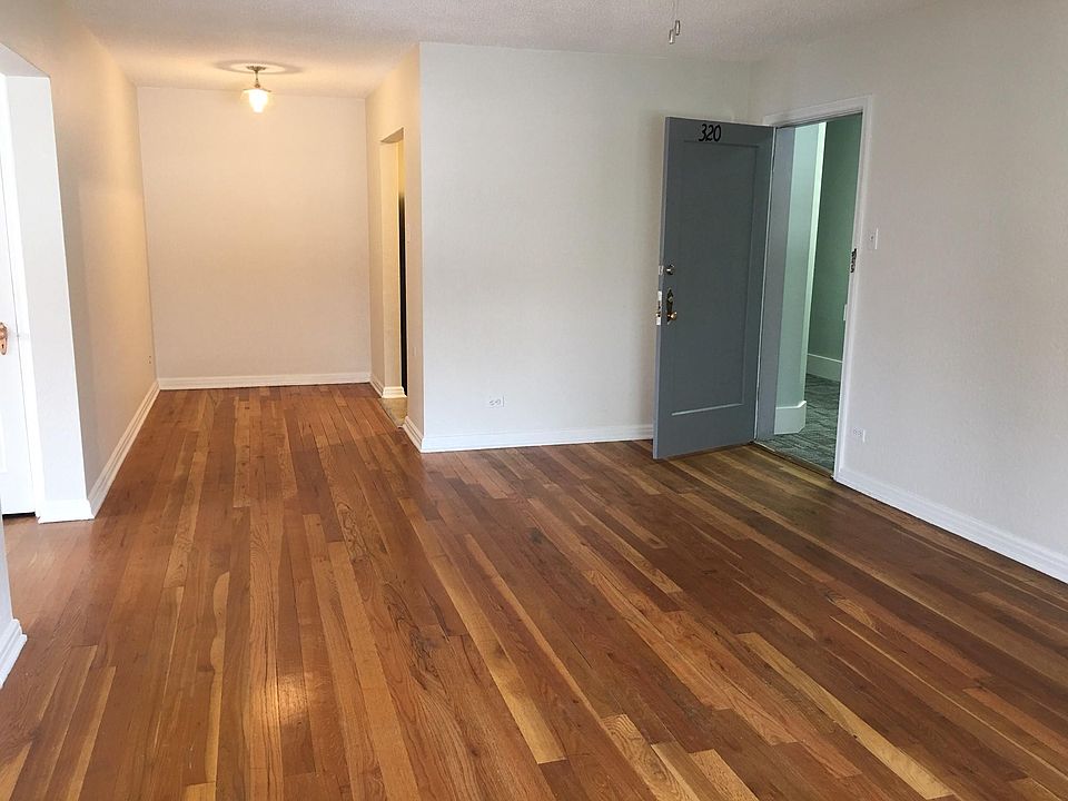Welcome to your new living room. Gorgeous hardwood floors.