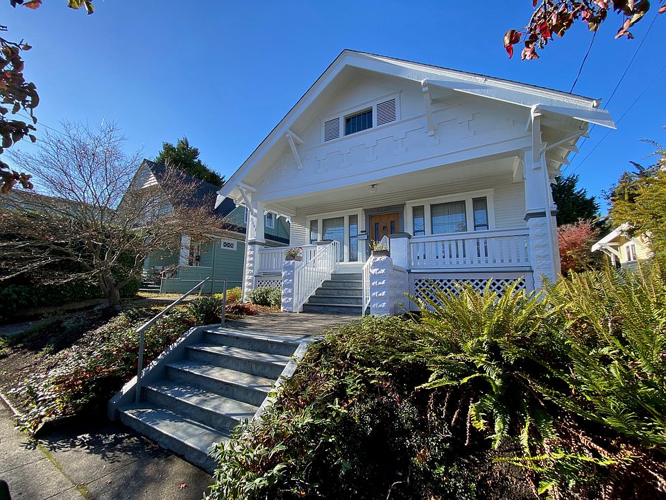 View from the 4th Ave. N. sidewalk. Driveway, not pictured, is located to the left side of the house.