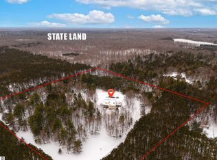 3855 Pulver Woods Dr, Williamsburg, MI 49690