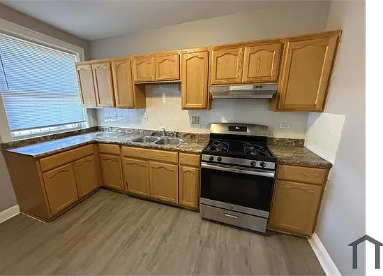 7053 S Yale Ave — Photo 1
