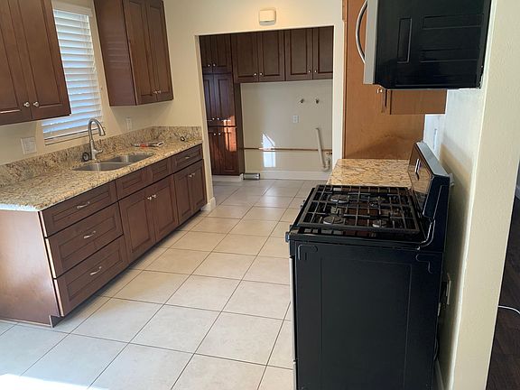 Kitchen with Built in Stove & Micro Wave & Granite Counter Tops