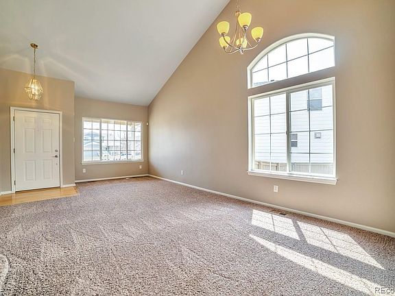 Great Room with high ceilings as you enter the front door.