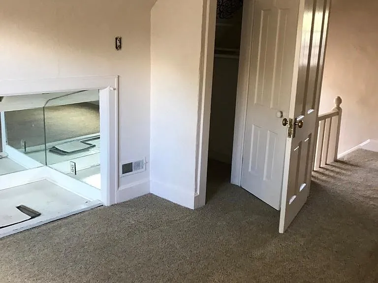 Front upstairs bedroom with skylight and closet