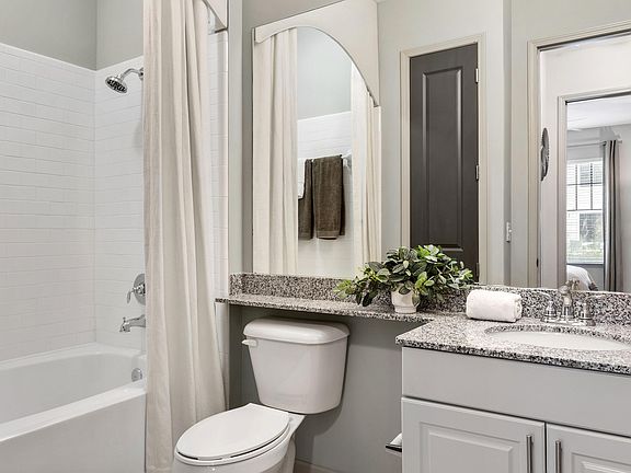 Experience modern elegance in this beautifully designed bathroom space.