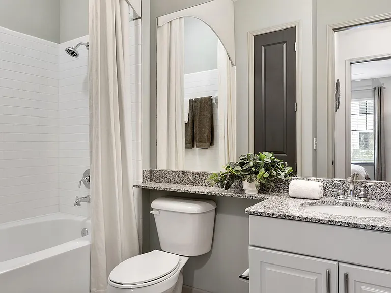 Experience modern elegance in this beautifully designed bathroom space.