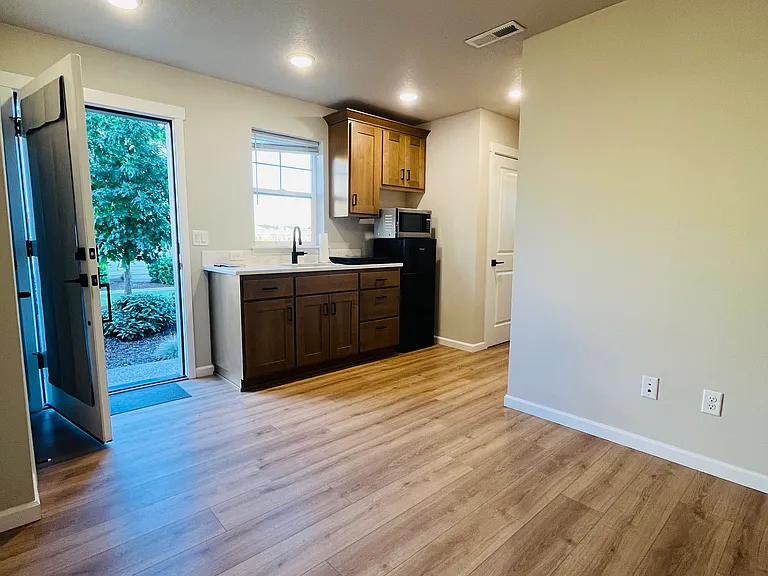 Entry and Kitchenette. Microwave, Compact Fridge and Induction stove included.