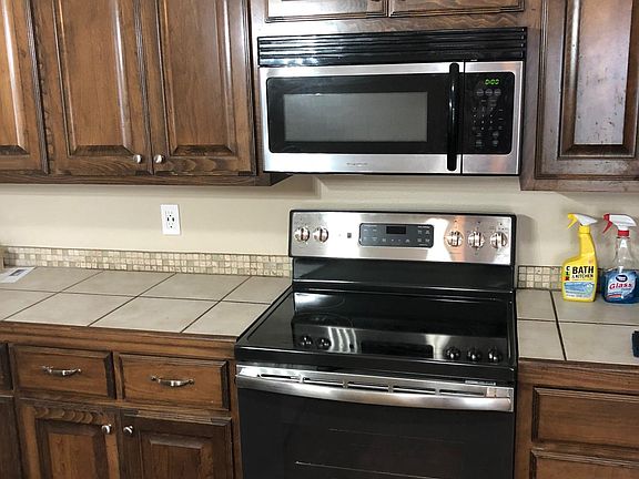 House has builtin microwave, oven and dishwasher