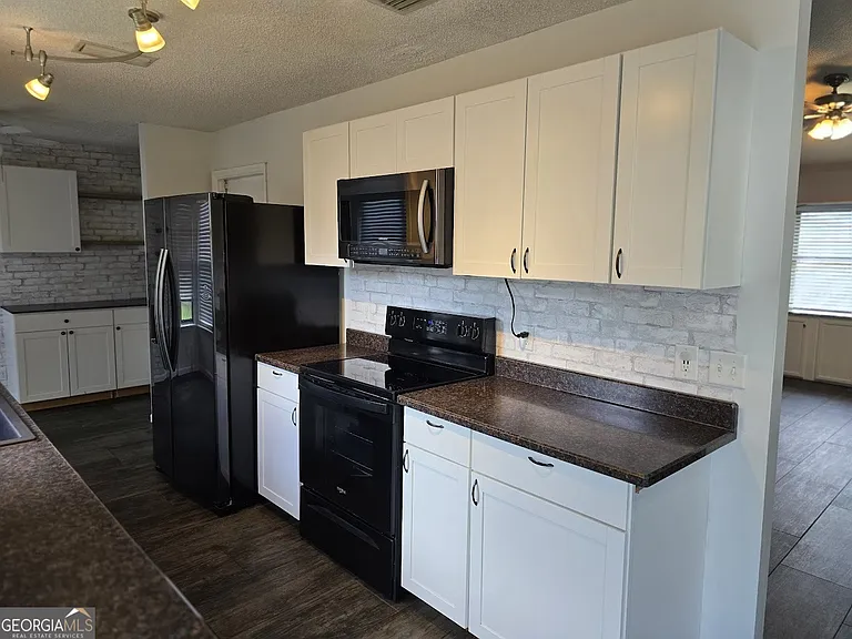 1001 Regal Rd — Photo 17