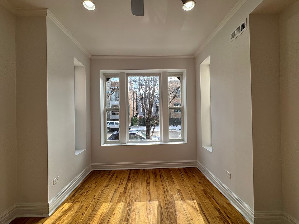 Large windows with a lovely neighborhood view in the living room